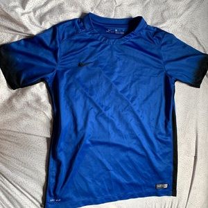 Blue Nike Dri-Fit shirt